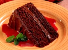 Chocolate cake with strawberry sauce