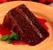 Chocolate cake with strawberry sauce